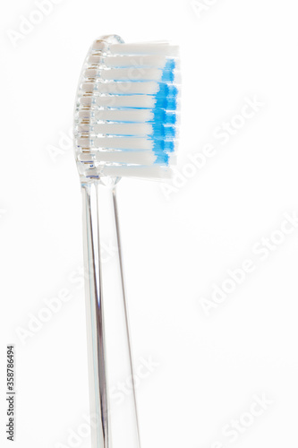 new toothbrush close-up on white background