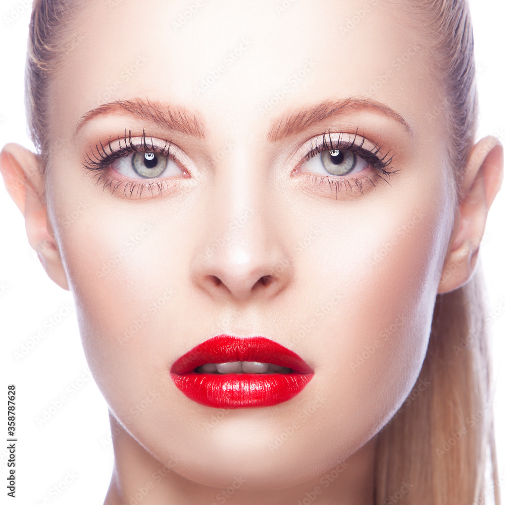 Close-up portrait of sexy caucasian young model with glamour red lips make-up. Perfect clean skin Close-up portrait of sexy caucasian young model with glamour red lips make-up. Perfect clean skin