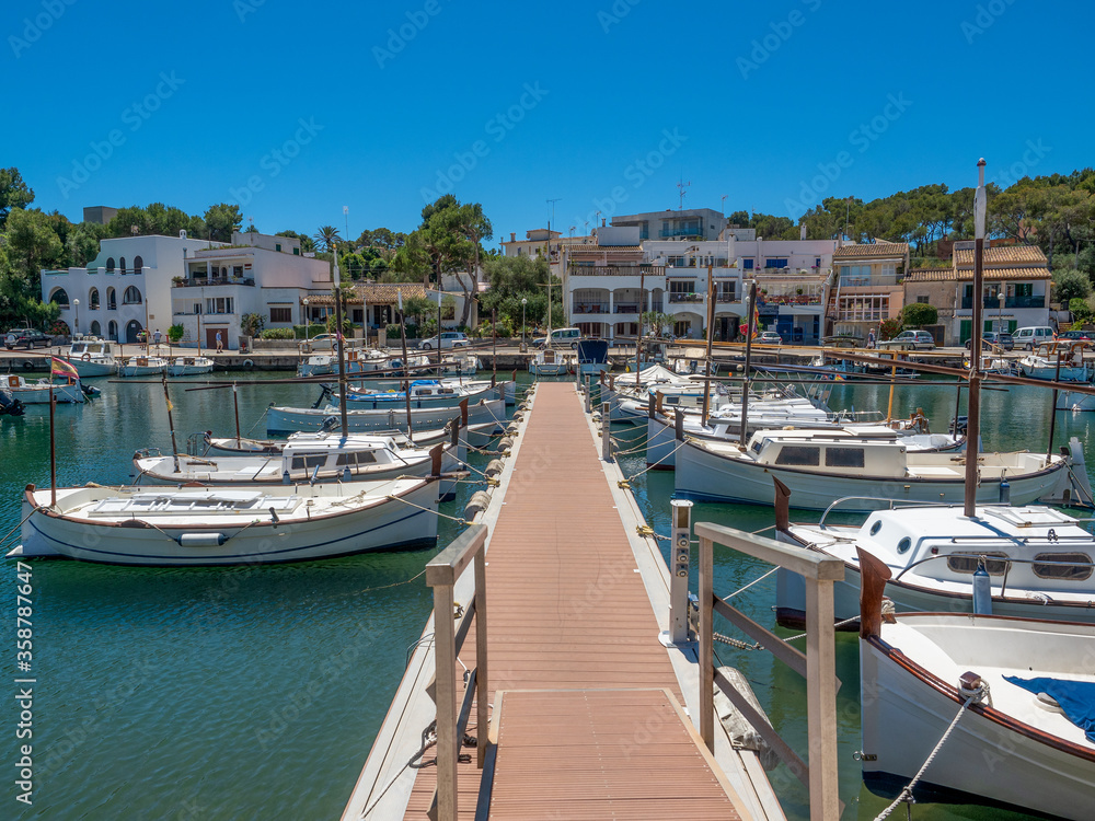 Porta Petro Mallorca Spain  fishing harbor with traditional fishing boats moored