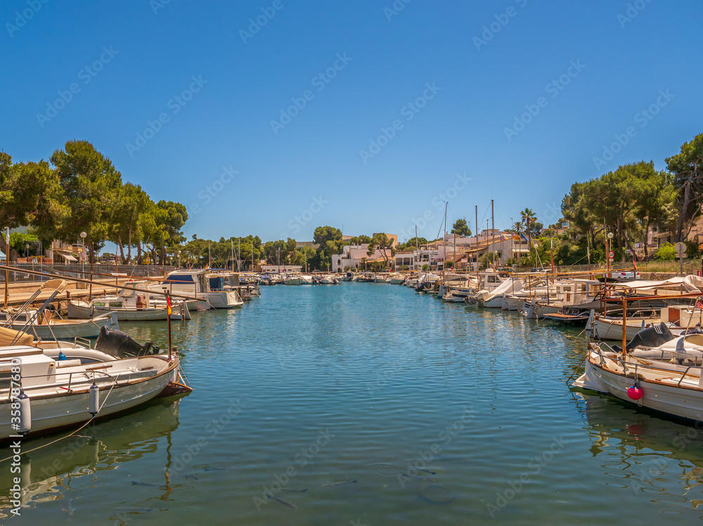 Porta Petro Mallorca Spain   marina  harbour with traditional fishing boats and pleasure craft moored