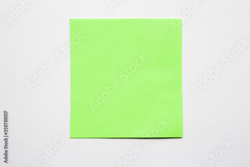 Green note on a white sticky note, carved, single, sticky, notepad