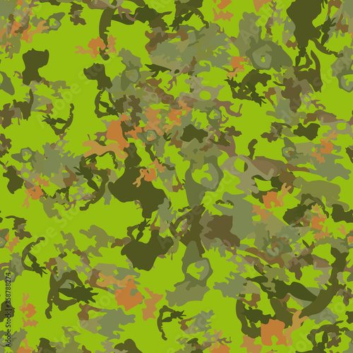 Forest camouflage of various shades of green, brown and orange colors