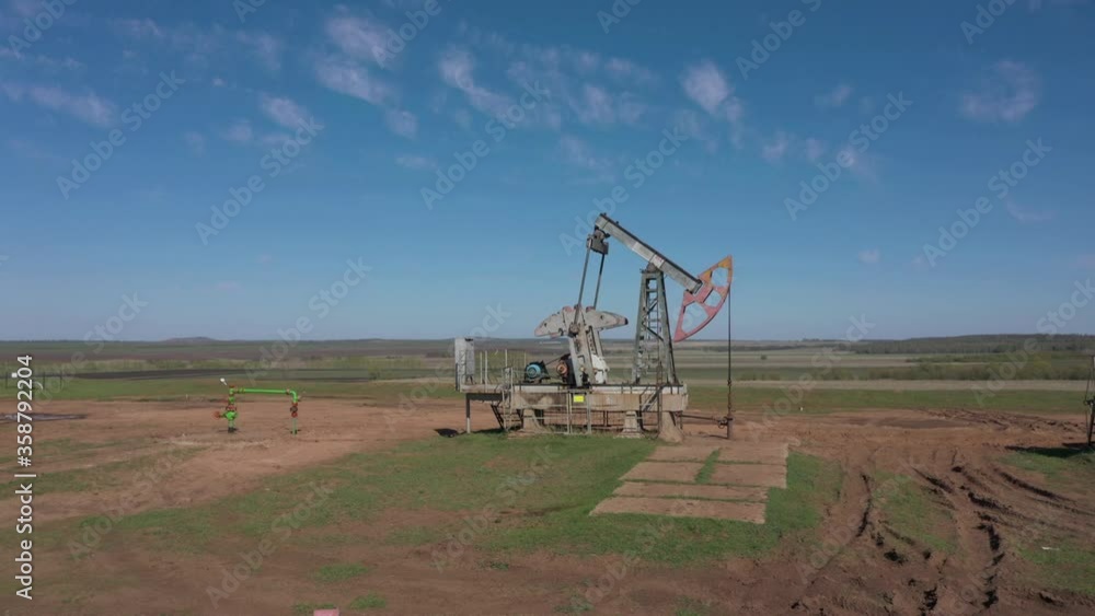 A big oil derrick in work, aerial video 4k A big oil derrick in work, aerial video 4k