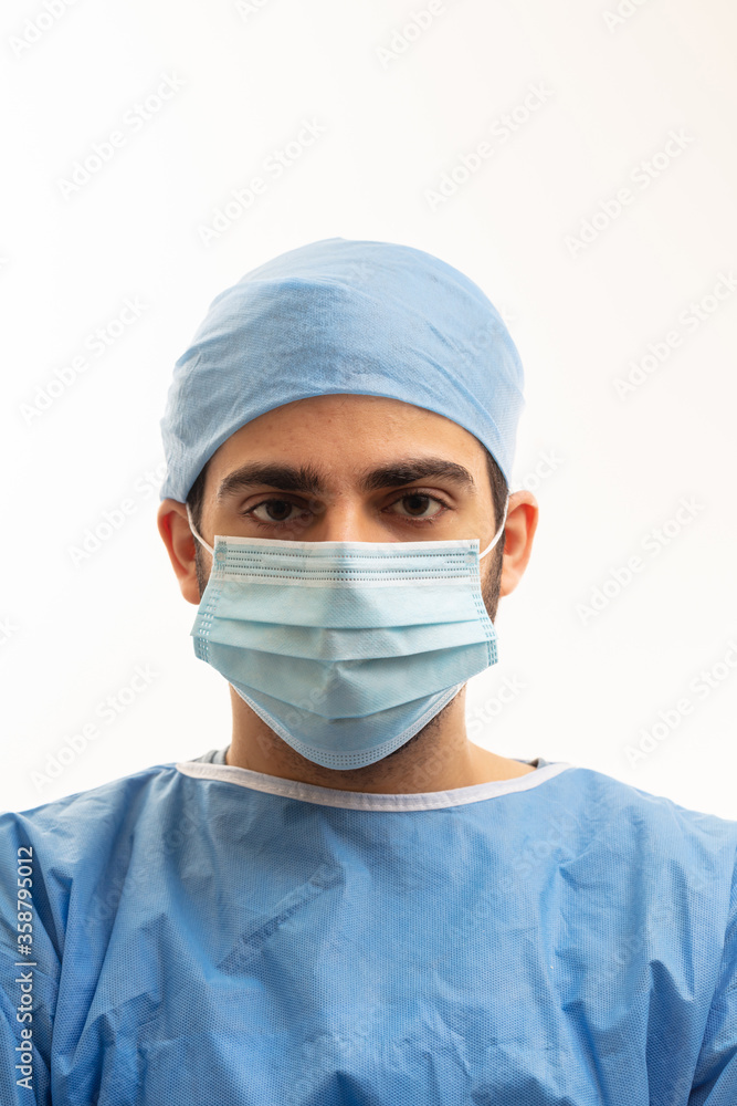 Doctor with surgical mask isolated on white background. Doctor with surgical mask isolated on white background.
