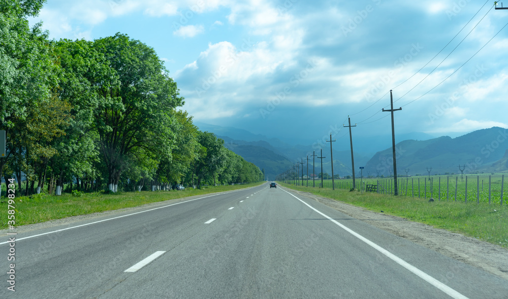 Auto road leading to the mountains Auto road leading to the mountains
