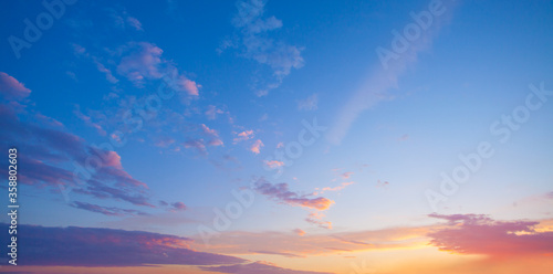 Fototapeta Naklejka Na Ścianę i Meble -  Sunset sky clouds background. Beautiful landscape with clouds and orange sun on sky