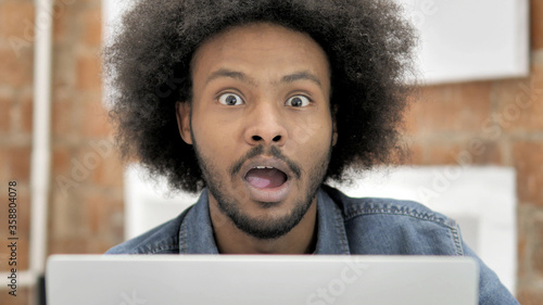 Close up of Shocked African Man at Work