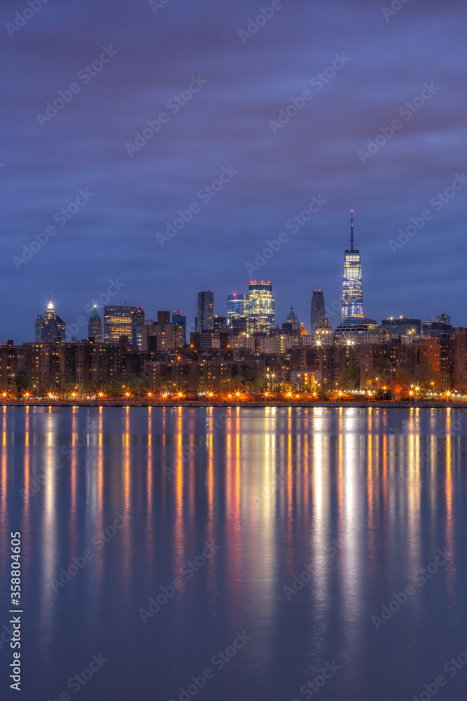 View on Downtown Manhattan from East river with long exposure at dawn