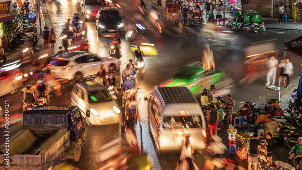 Hanoi, Vietnam, timelapse view of rush hour traffic on busy intersection in the Hoan Kiem district aka Hanoi Old Quarter.
