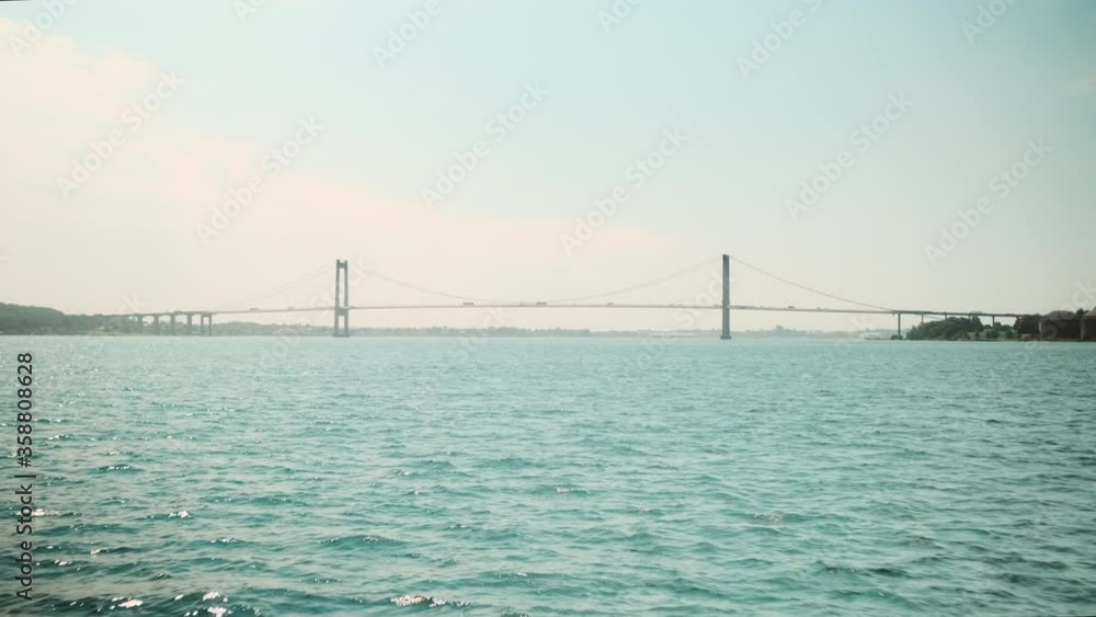 Majestic Shot Across the Clear Waters and Little Belt Bridge, Denmark Majestic Shot Across the Clear Waters and Little Belt Bridge, Denmark