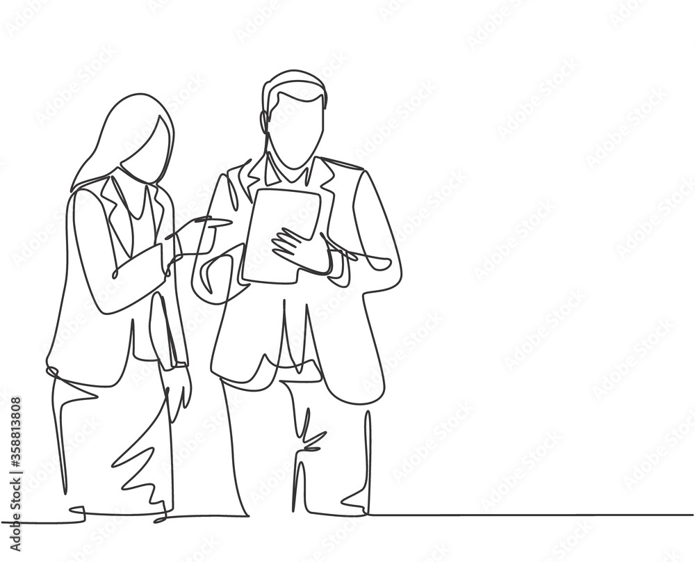 One single line drawing of young male and female employee discussing work while watching annual report graph on tablet phone. Job discussion concept continuous line draw design vector illustration