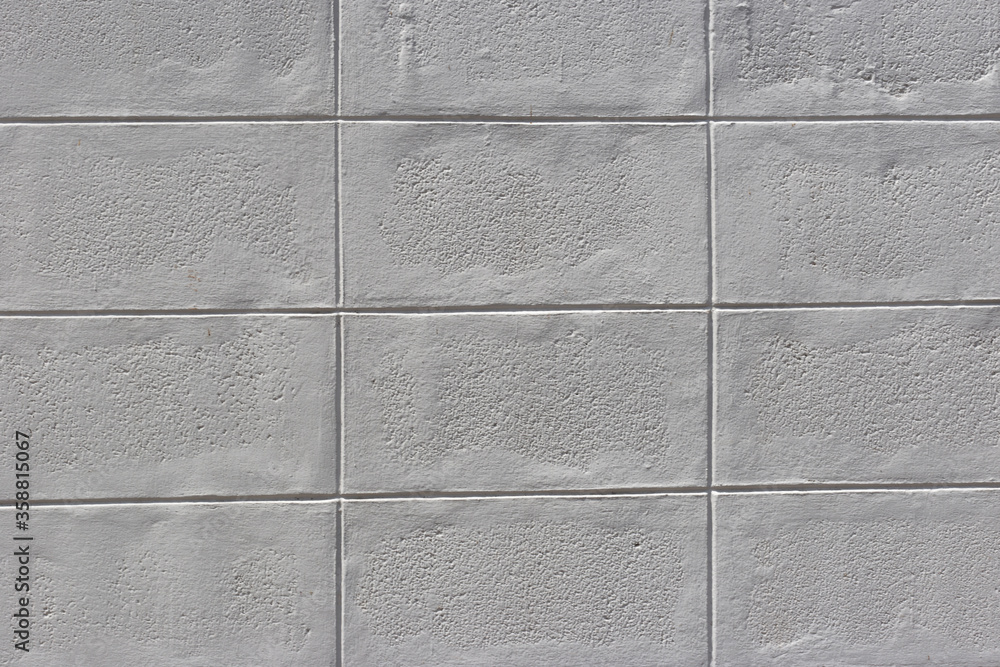 Fototapeta premium wall surface has a white square pattern with shading