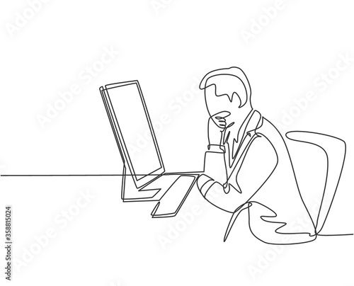 One continuous line drawing of young manager thinking seriously on his desk while holding glasses in front the laptop. Business innovation process concept single line draw design vector illustration