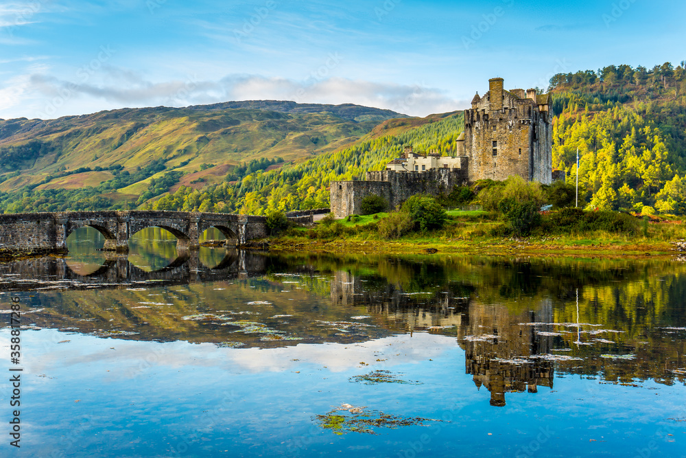 Reflection of Eilean Donan Castle in the morning - Dornie, Scotland - United Kingdom