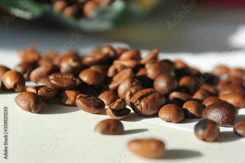 roasted brown coffee beans close up background shot