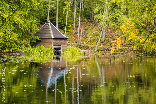 Reflection landscape the park during early autumn period