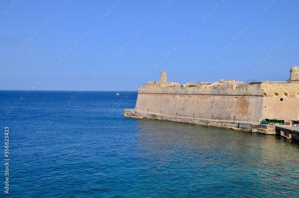Fort Saint Elmo is a star fort in Valletta, Malta. It stands on the seaward shore of the Sciberras Peninsula that divides Marsamxett Harbour from Grand Harbour, and command the harbour entances.