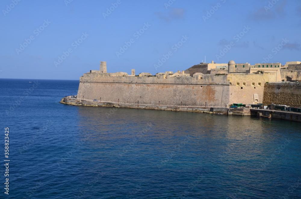 Fort Saint Elmo is a star fort in Valletta, Malta. It stands on the seaward shore of the Sciberras Peninsula that divides Marsamxett Harbour from Grand Harbour, and command the harbour entances.