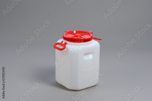 Plastic white food barrel, with red lid, container, for liquids, on a white background, online store