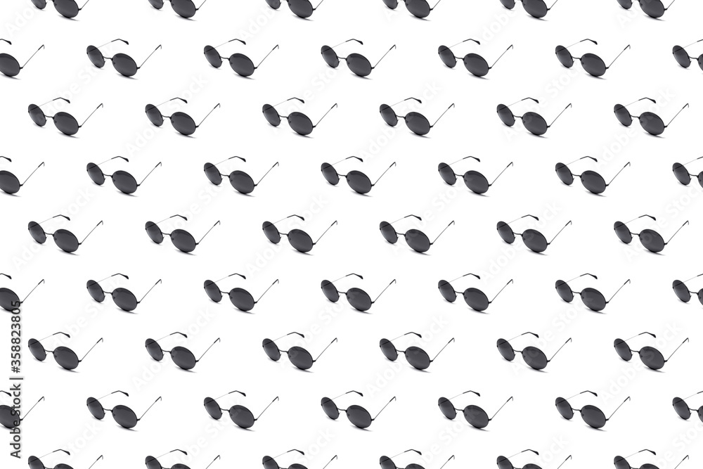 Pattern with black sunglasses for design on a white background Pattern with black sunglasses for design on a white background