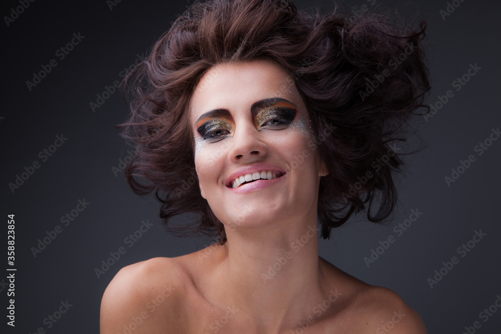 Fototapeta premium Young beautiful stylish girl posing in studio.