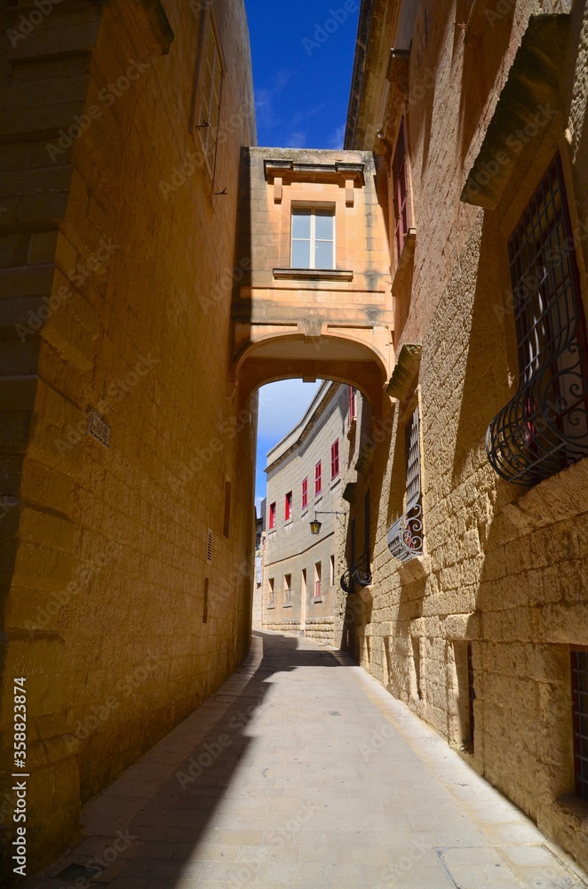 Beautiful view of ancient narrow medieval street town Mdina, Malta
