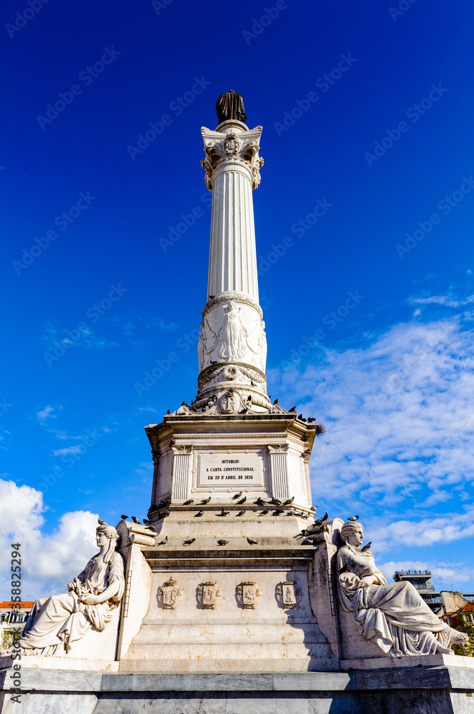 It's Column of Pedro IV on Rossio Square (Pedro IV Square) in Lisbon, Portugal.