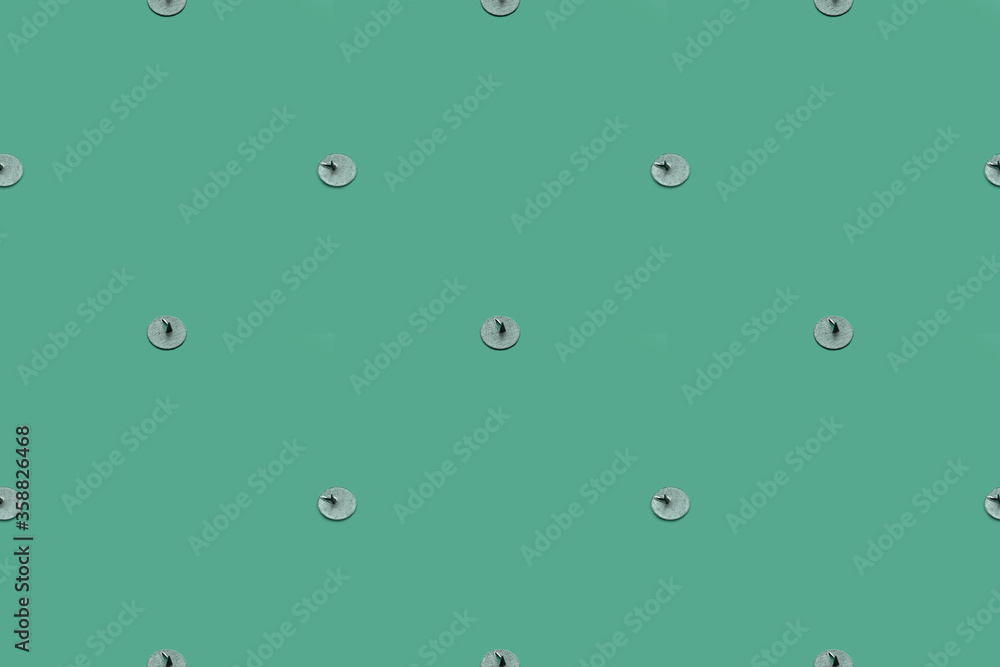 Pattern with push pins on a green background for school design Pattern with push pins on a green background for school design