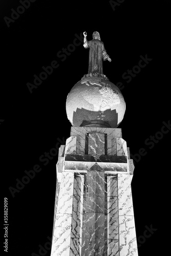 It's Jesus Christ stutue on the globe (Monument to the Divine Savior of the World), San Salvador, El Salvador photo