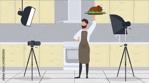 A male cook in the kitchen has a culinary blog. The guy in the kitchen apron is holding fried chicken. Vector.