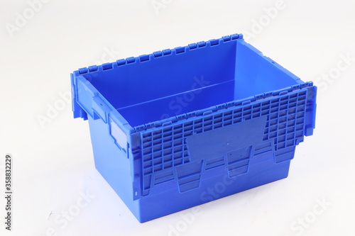 Blue plastic box, container for storing and transferring fruits and vegetables, food, for storing things, on a white background, online store