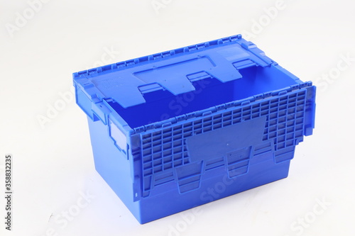 Blue plastic box, container for storing and transferring fruits and vegetables, food, for storing things, on a white background, online store