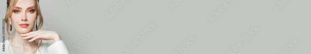 Beautiful blonde woman on white banner background