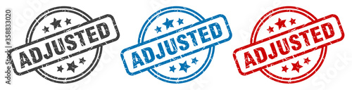 adjusted stamp. adjusted round isolated sign. adjusted label set