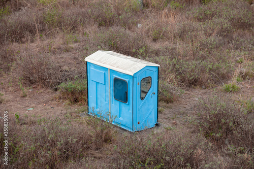 Security booth in the middle of the field plus.