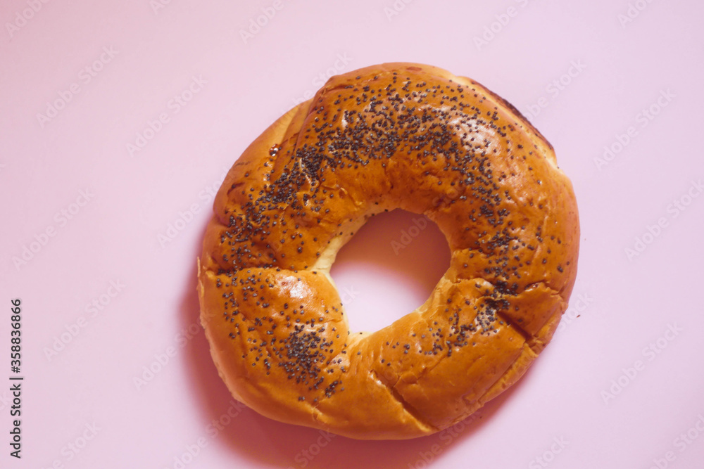 Bagel with poppy seeds. Bakery concept. Bagel with poppy seeds. Bakery concept.