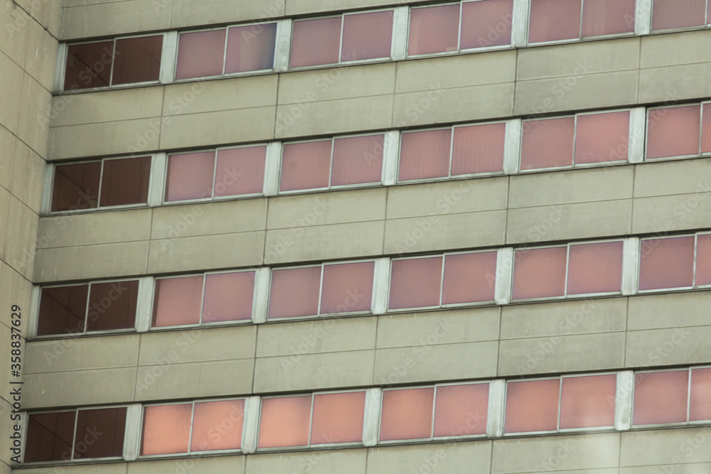 Reflection glass and toned windows of modern city building. Reflection glass and toned windows of modern city building.