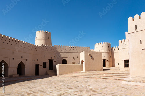 Patio of fort of Bani bu Hassan in Oman, with its typical beige clay color