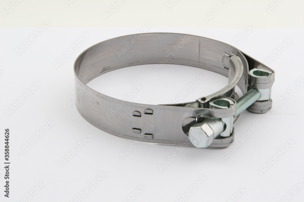 Obraz premium clamp connecting elements (staples) used for fixing and sealing the connection of hoses, pipes and other rigid and flexible pipelines. for business, on a white background, online store