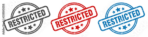 restricted stamp. restricted round isolated sign. restricted label set photo