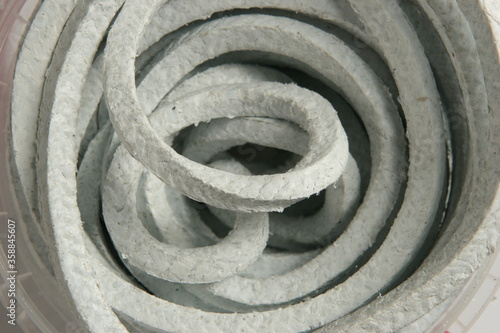 asbestos cord in packaging, for business, on a white background, online store