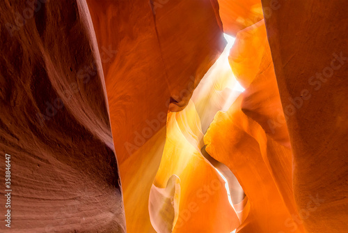 A shaft of light shines into lower Antelope, Canyon, Page, Arizona