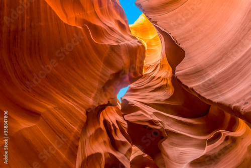 A view from the bottom of the canyon looking up to the sky close to the entrance to Lower Antelope, Canyon, Page, Arizona