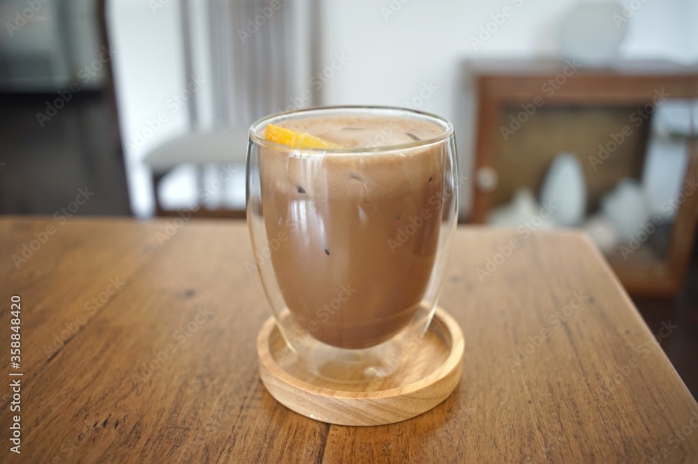 Iced chocolate in a glass at coffee shop Iced chocolate in a glass at coffee shop