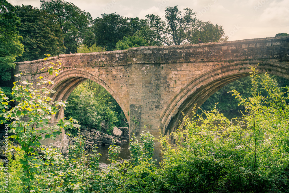 A view of Devils Bridge, a famous landmark on the river Lune near Kirkby Lonsdale, Cumbria, UK