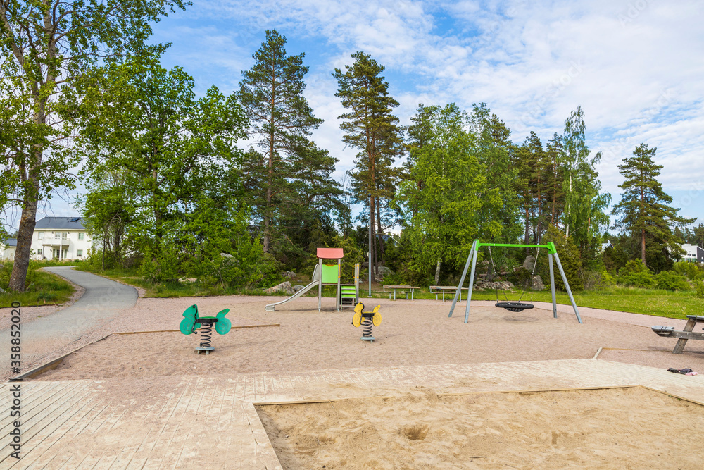 Modern playground with beautiful nature around.  Sweden. Europe.
