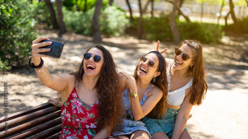 Three girls making a selfie