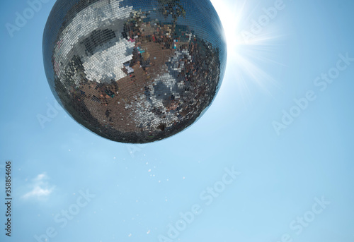 Mirror disco ball. Giant glitter ball, with the sky as a background. Disco ball in the sun.  Greece. Crete. Hersonissos. Water Park-Star Beach (Star Beach Village & Water Park) 24.08.2017