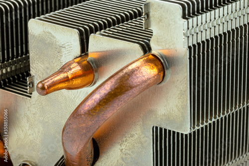 Slika na platnu Macro photo of an aluminum heat sink from a pc with visible copper heat dissipation tubes