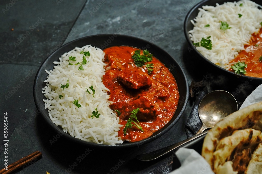 Creamy Butter Chicken/Murgh Makhani served with Roti and Basmati rice Creamy Butter Chicken/Murgh Makhani served with Roti and Basmati rice